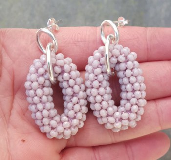 Zilveren oorbellen met ovale hanger van lila paarse kristallen